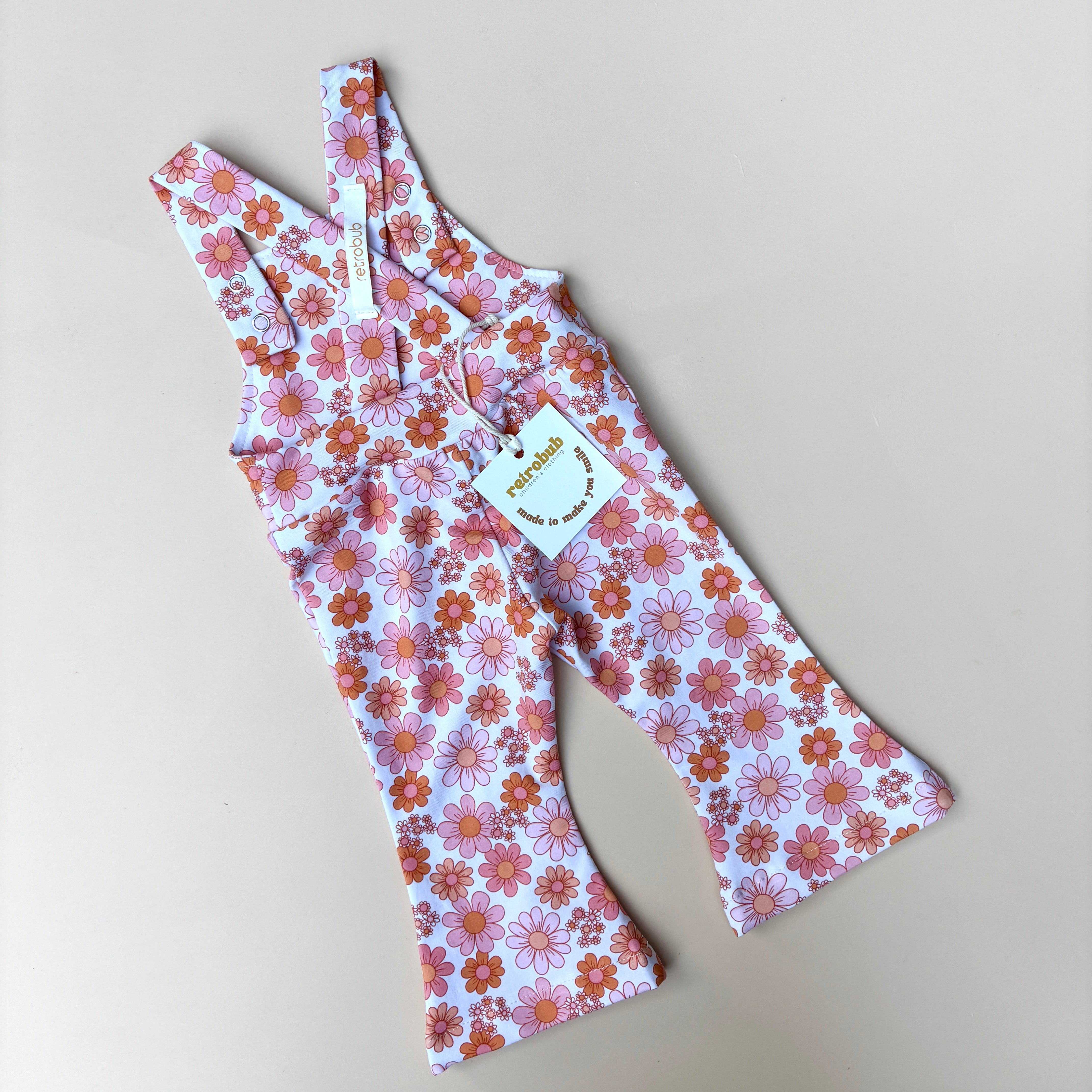 PINK daisy bells overalls